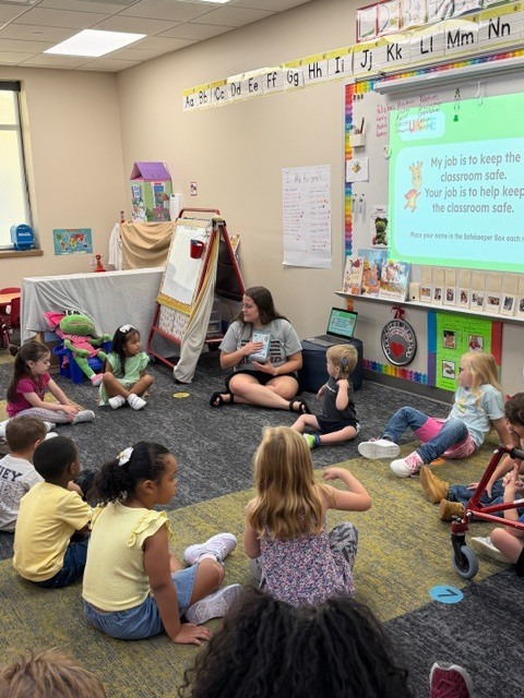 Ms. Claire teaching during morning meeting