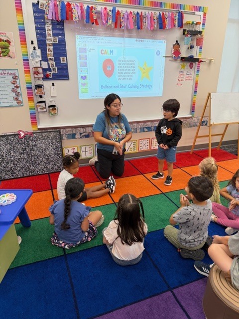 Ms. Bonilla teaching during morning meeting