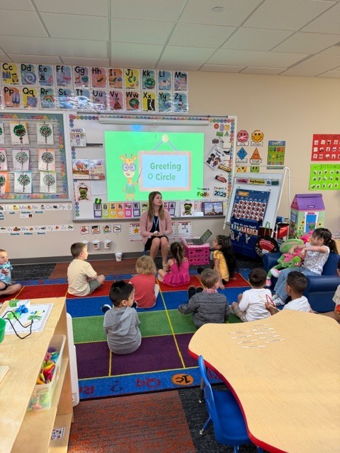Ms. Settles teaching morning meeting