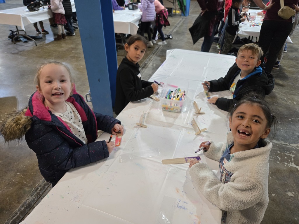 1S students working on their airplanes. 