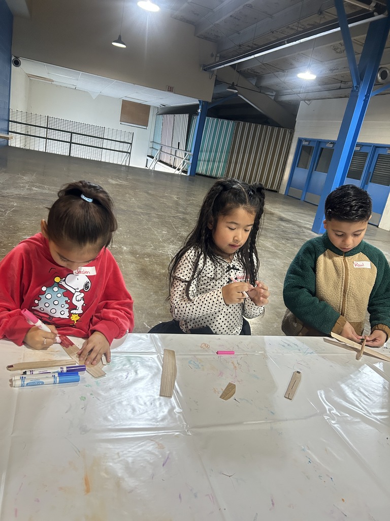 1S students working on their airplanes. 