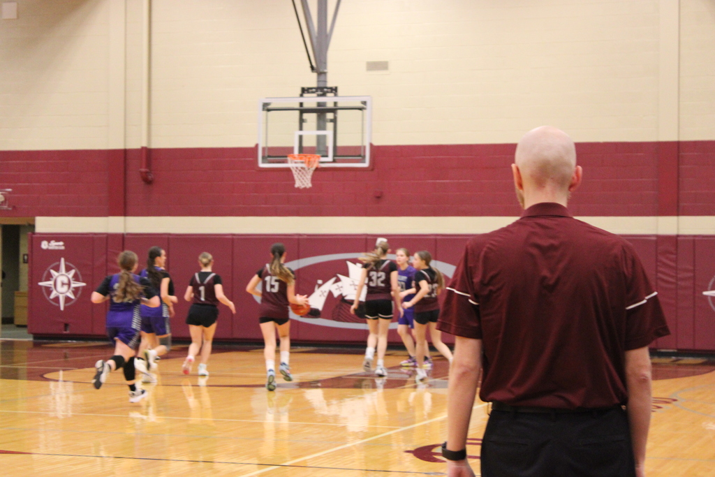 Coach looking at players