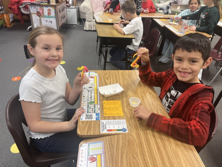 Pollination! We made pipe cleaner butterflies and “flew” from flower to flower observing how the pollen got from flower (cornmeal pollen) to flower (coffee pollen).
