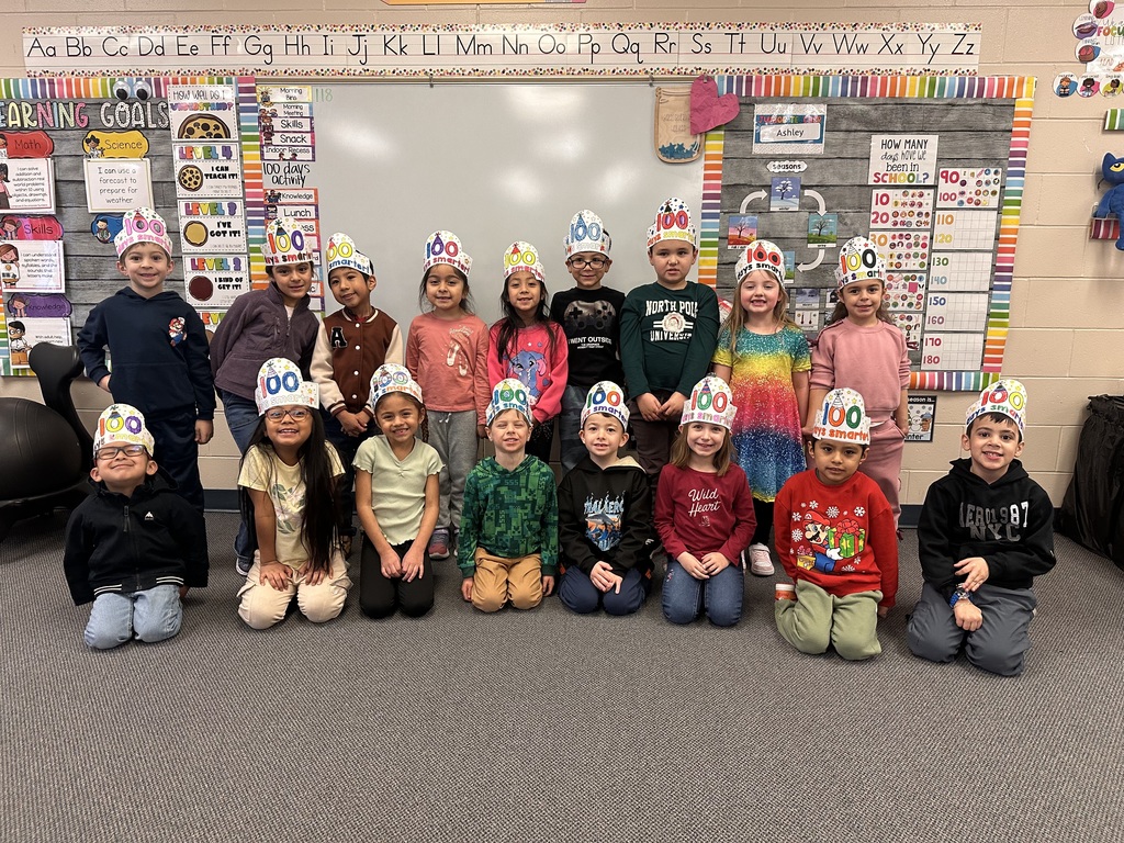 Class photo wearing 100 days of school crowns