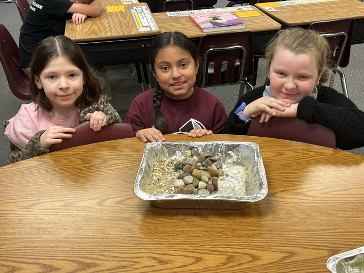This group built a breakwater so the waves will hit the rocks instead of the shore  