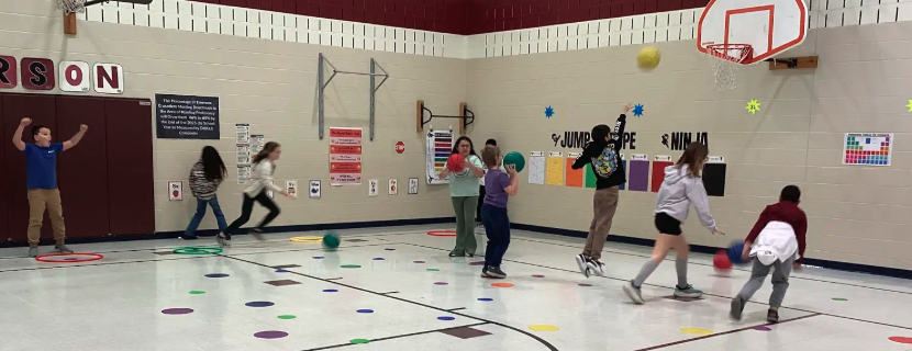 Students shooting baskets