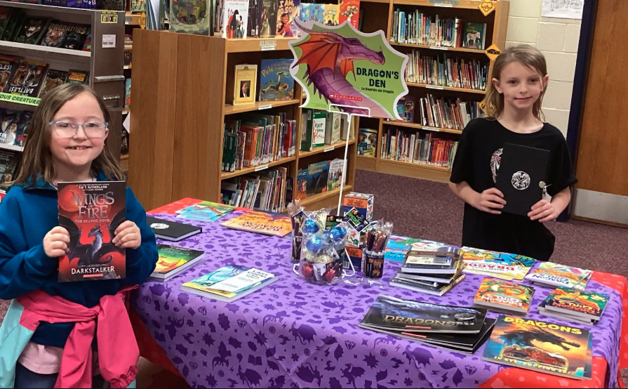 Students showing different sections of the book fair