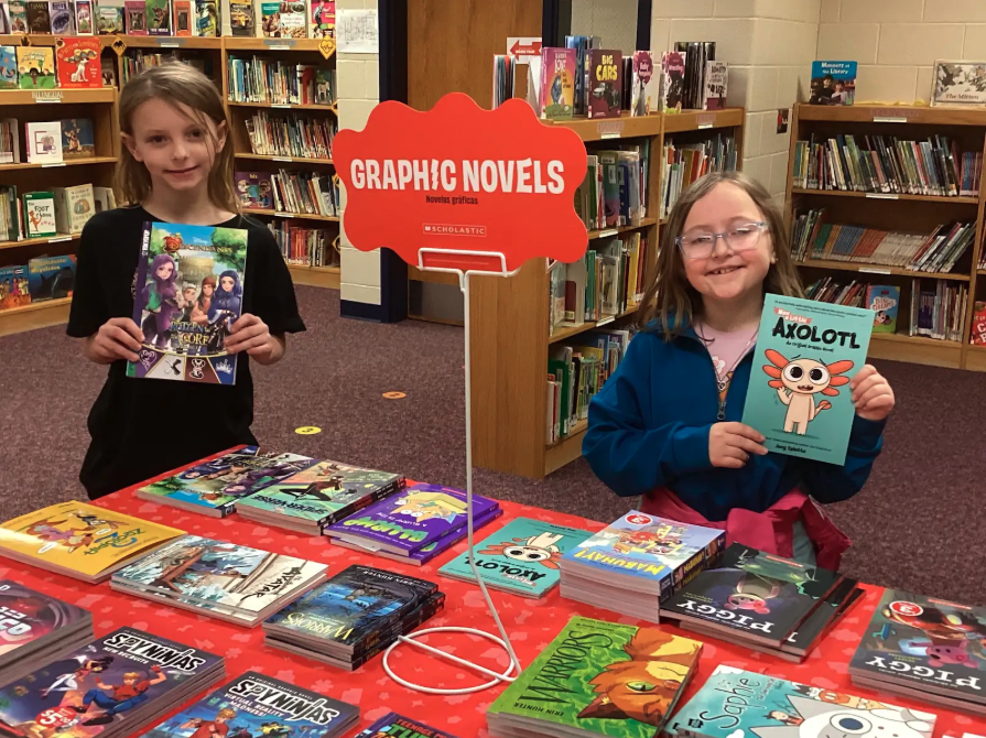 Students showing different sections of the book fair