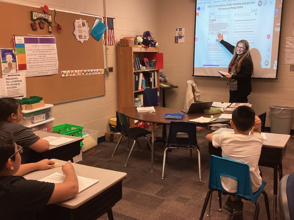 Mrs. Peterson with fourth grade students