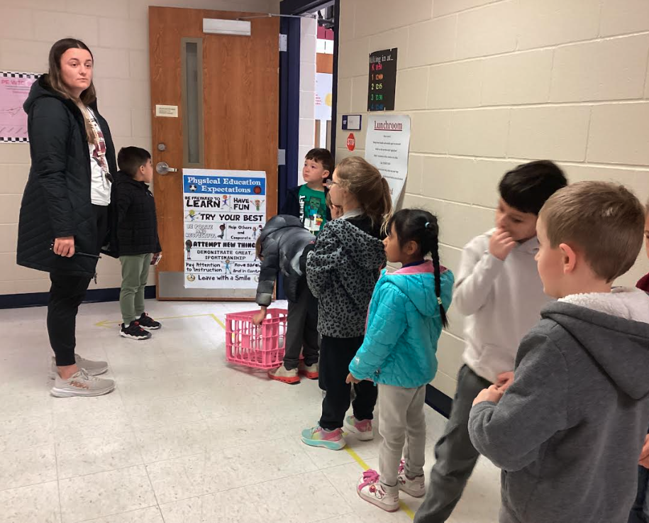 Ms. Nitz helping students line up for lunch