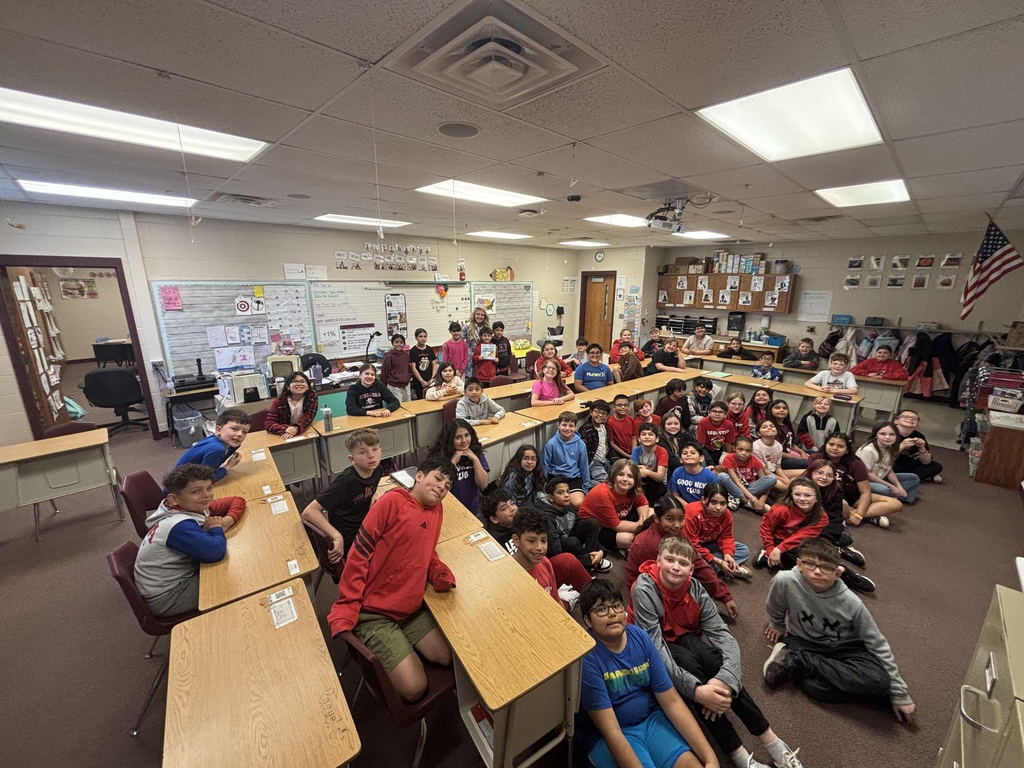 A grop picture with Alayna and our 4th graders