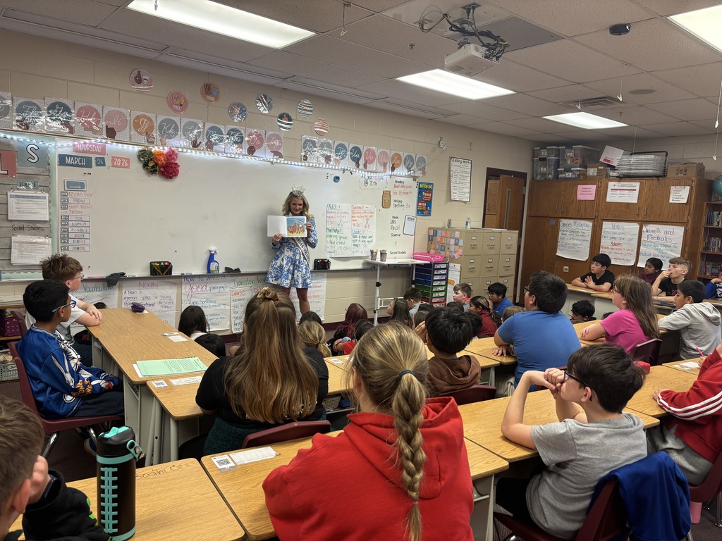 Alayna Wilson reading her book to our 4th graders.