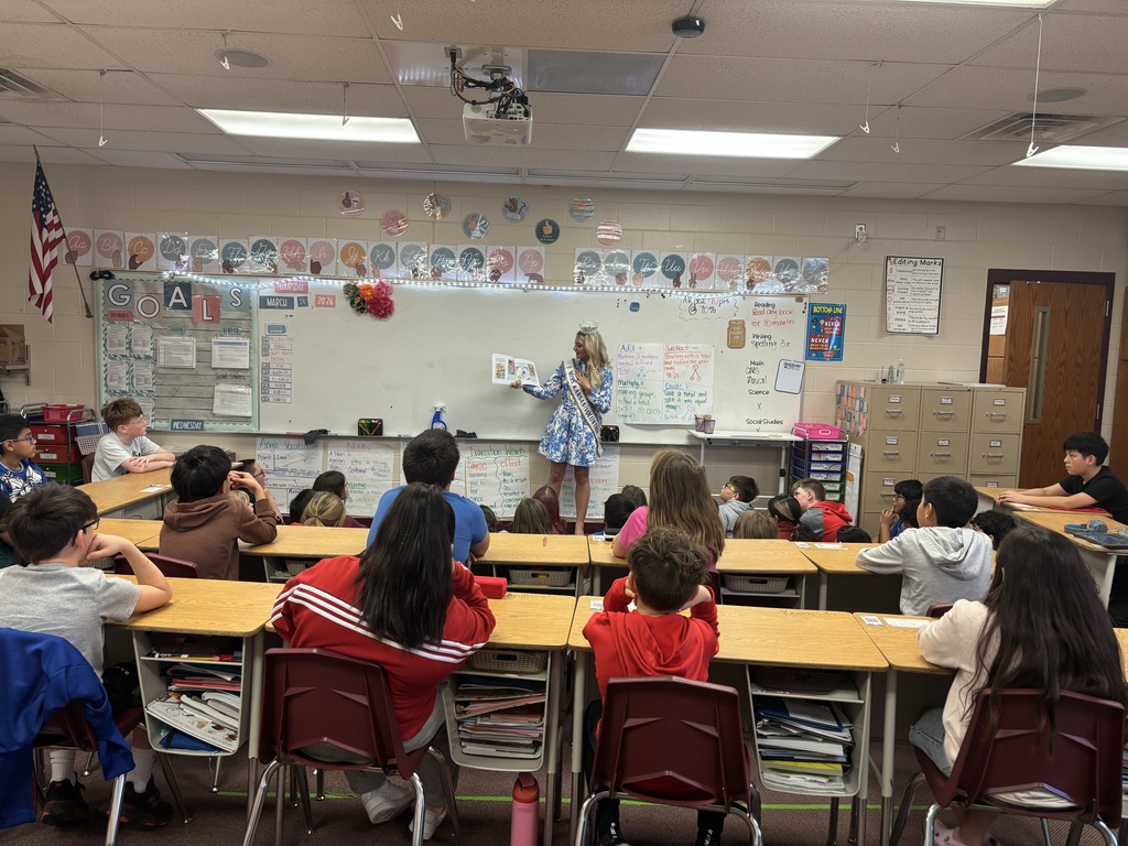Alayna Wilson reading her book to our 4th graders.