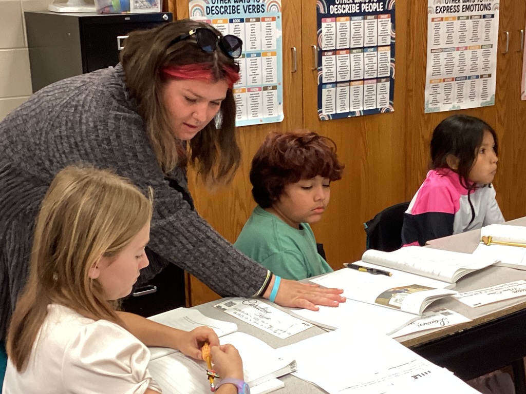 Ms. Wielgus helping a fourth grade student