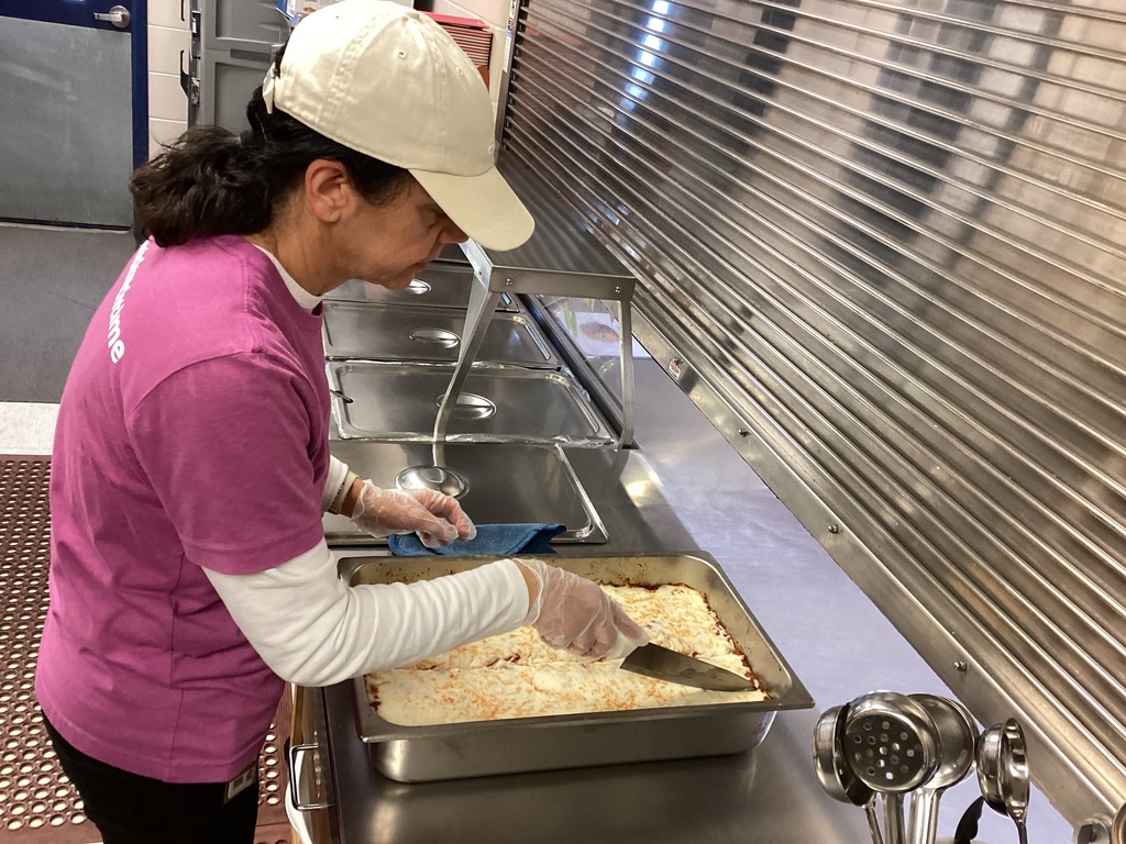 Mrs. Adabo in the kitchen