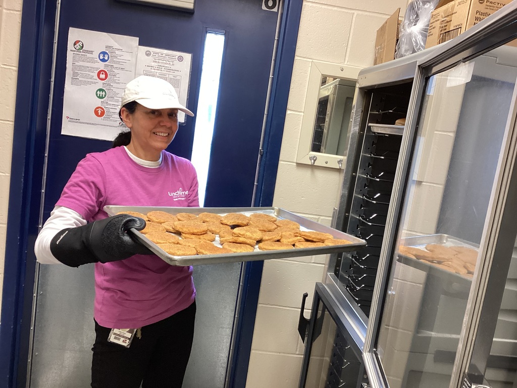 Mrs. Adabo in the kitchen