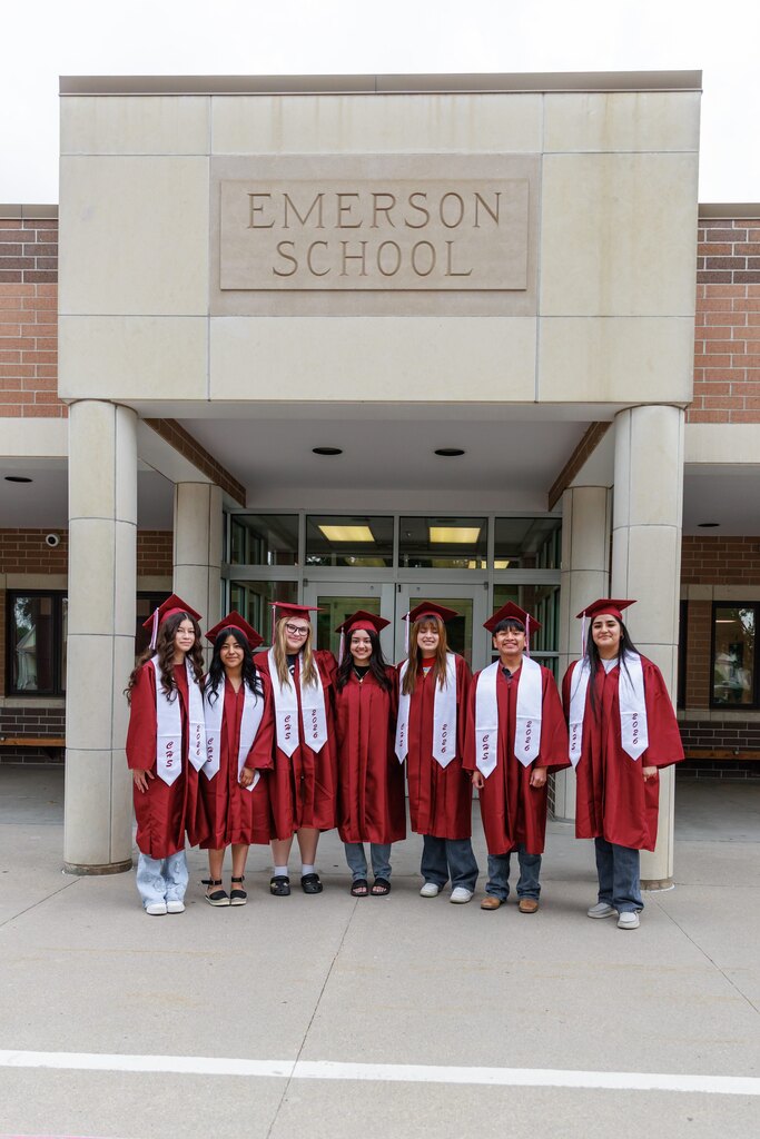 former emerson students in cap and gown who are graduating in 2026