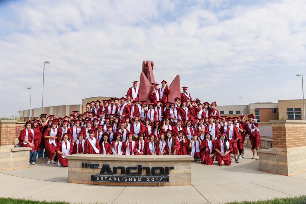CHS graduates who went on the graduation walks at the elementary schools.  Posed in front of the anchor located in front of Columbus High School.