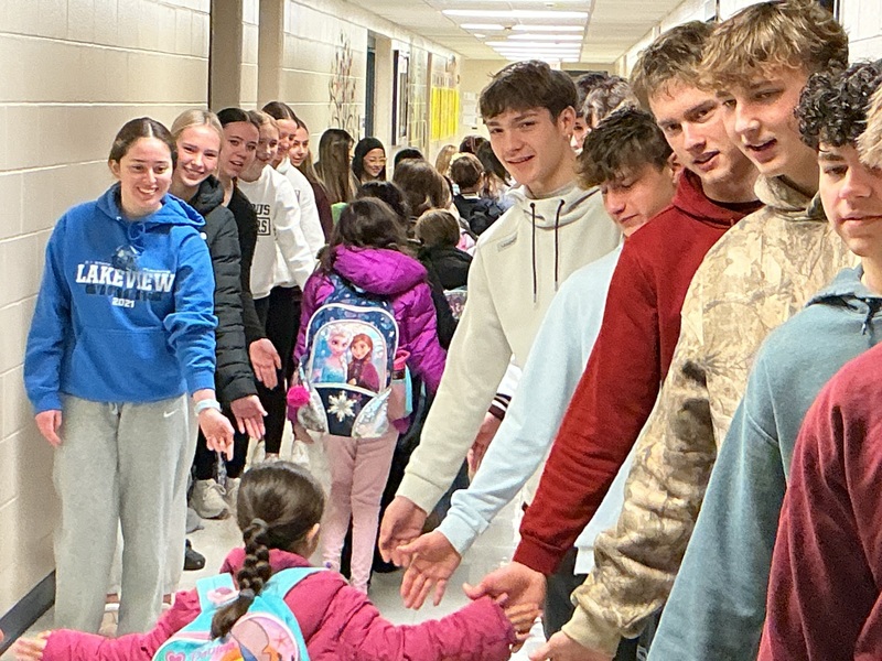 Students High Fiving
