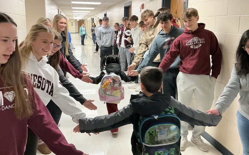 Students High Fiving