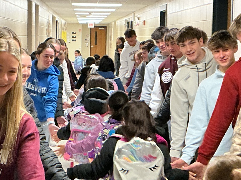 Students High Fiving