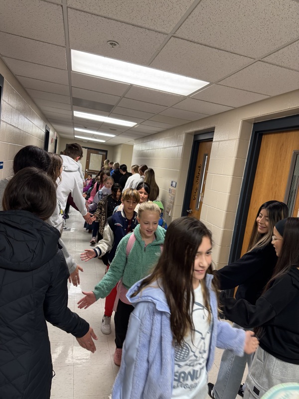 Students High Fiving