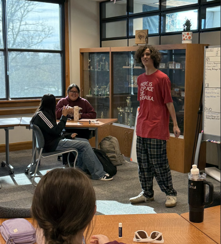 male student presenting his speech