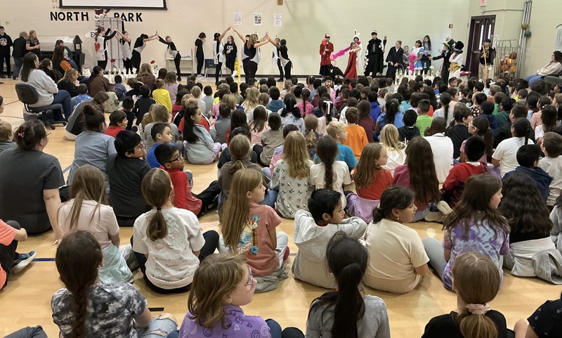 Students acting out the play, Alice in Wonderland