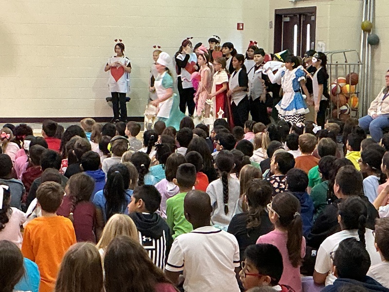 Students acting out the play, Alice in Wonderland