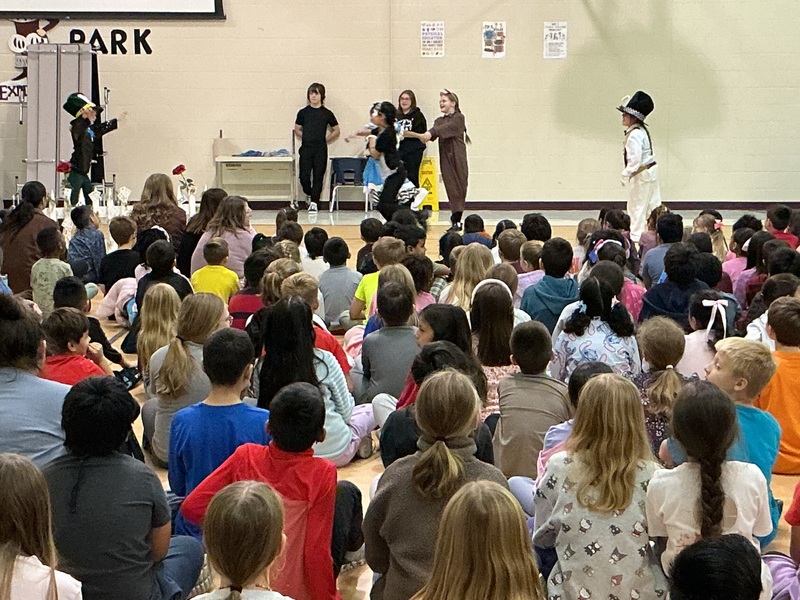 Students acting out the play, Alice in Wonderland