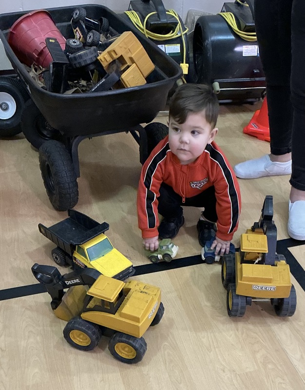 Boy with trucks
