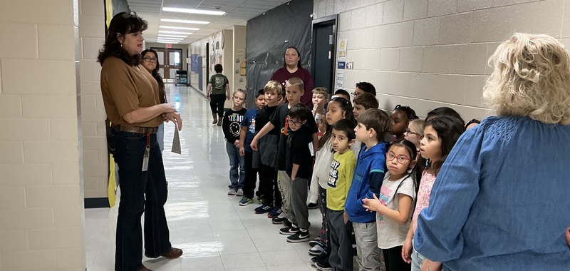 Students listening to their teacher