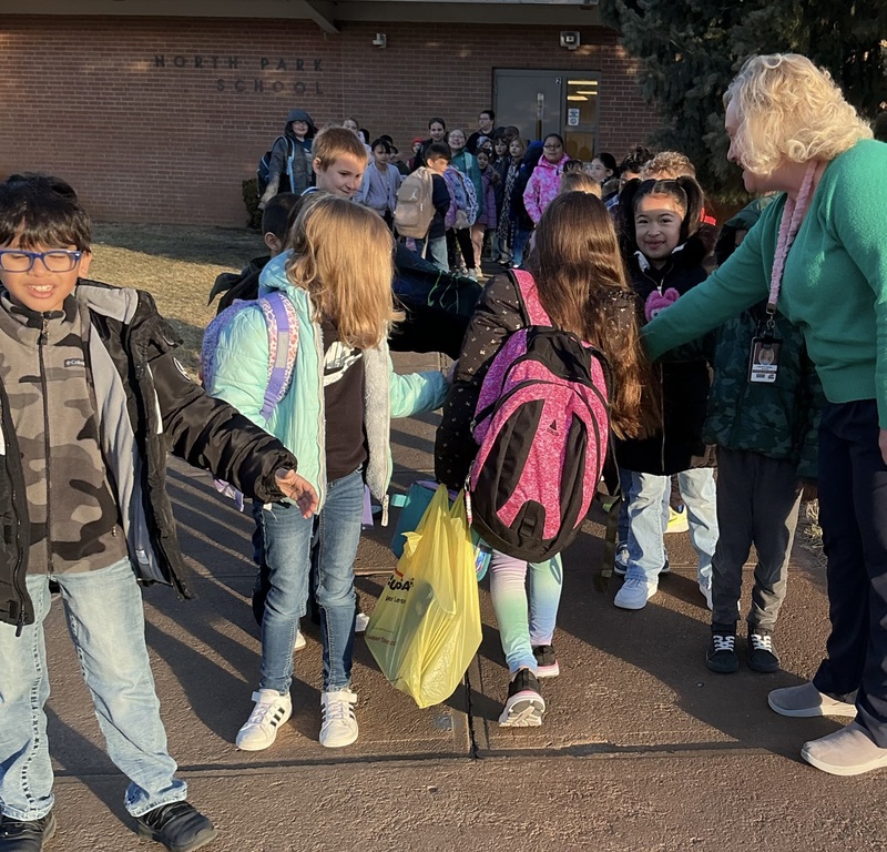 Kids giving high fives