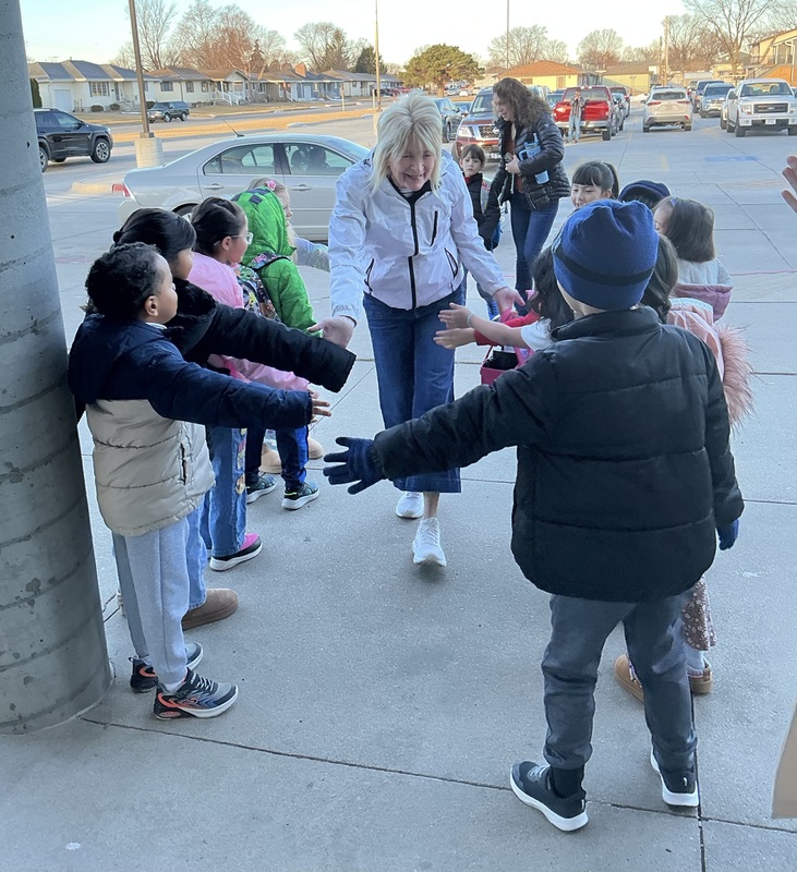 Kids giving high fives