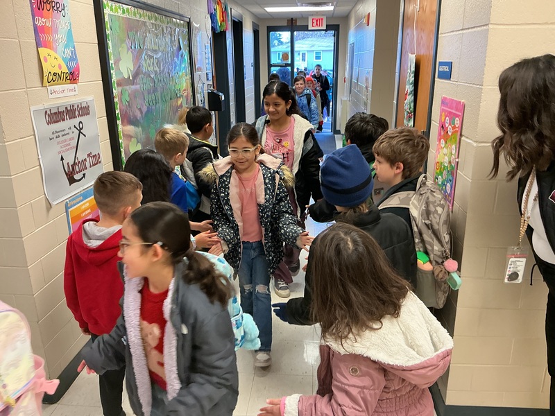 Kids giving high fives