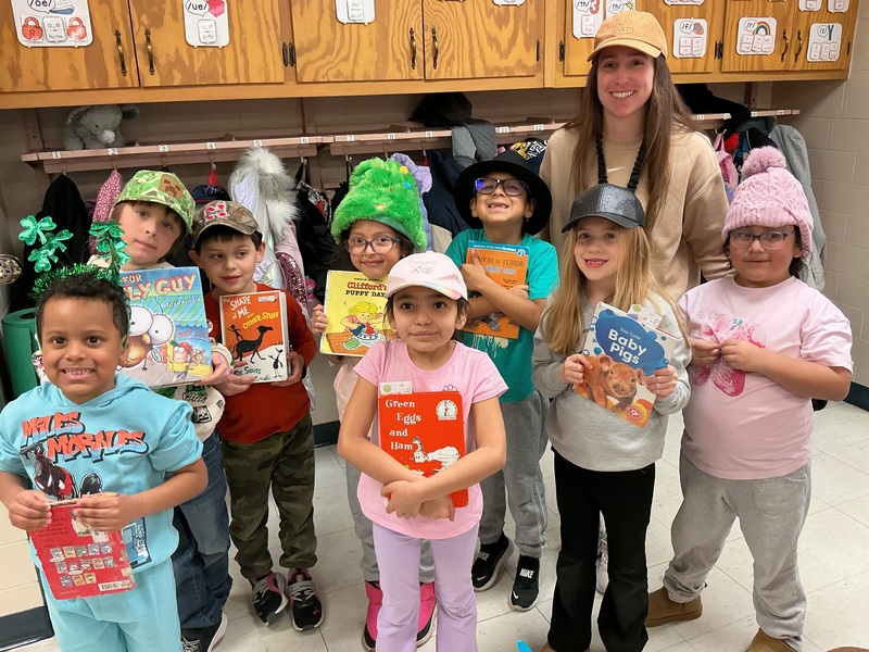 People in hats with books
