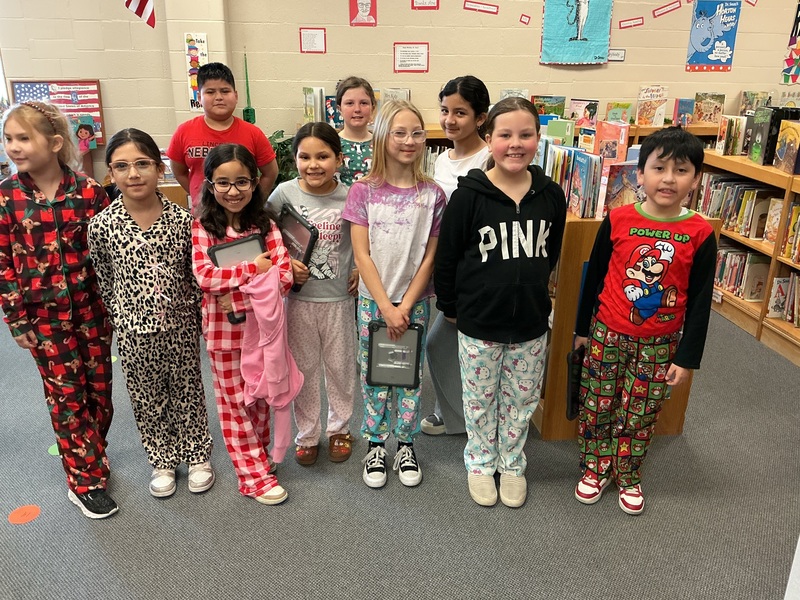 Kids in Pjs with books