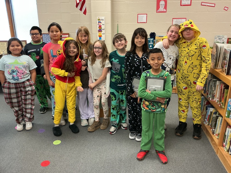 Kids in Pjs with books