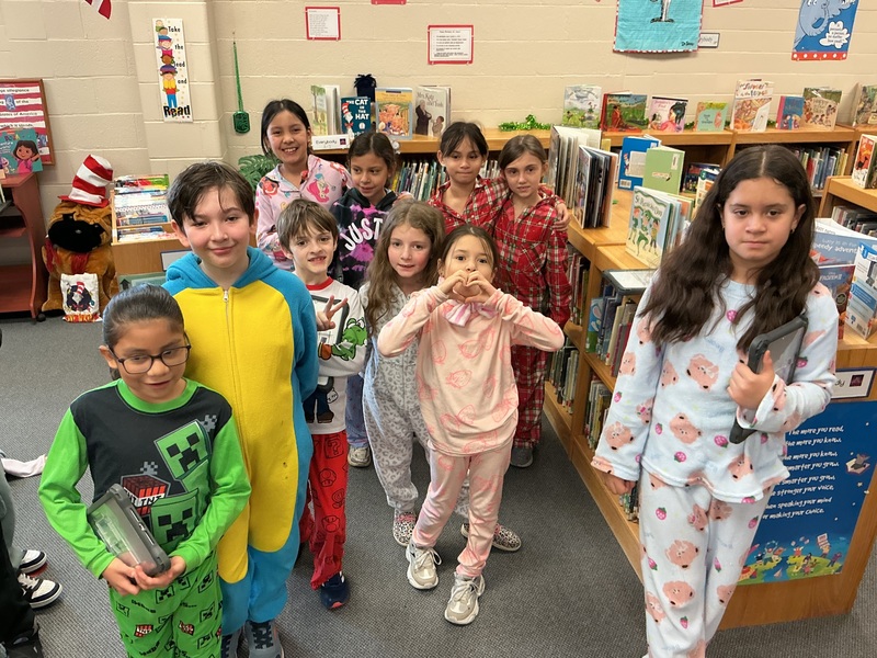 Kids in Pjs with books