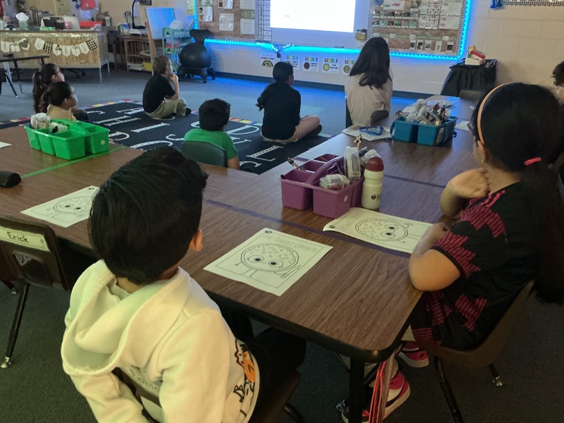 Students listening to a story.