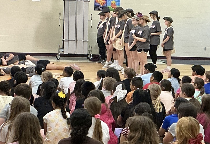 Kids performing a musical