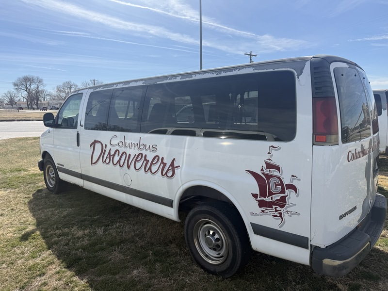 2000 Van with Columbus logos on the sides white lots of paint missing