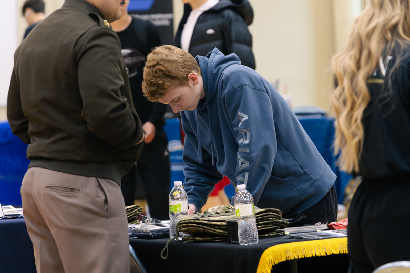 A CHS student fills out a form to receive more information from the U.S. Army. 