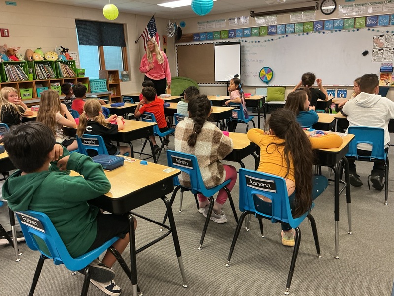 Children listening to teacher