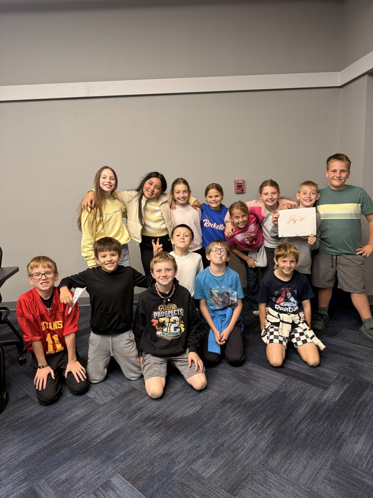 students standing together smiling