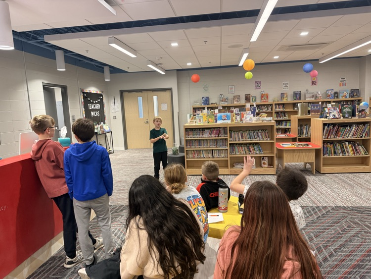 Kannon presents to the group