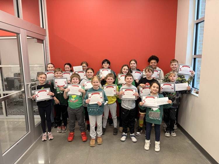 students smiling holding certificates 