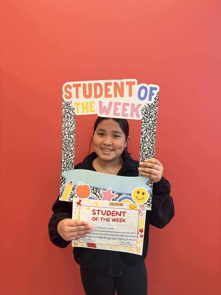 student holding certificate