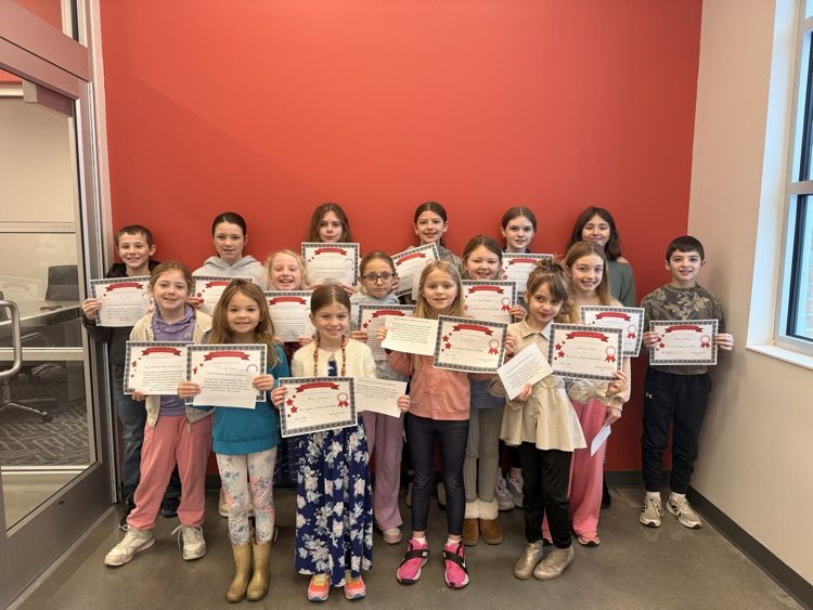 students holding their certificates