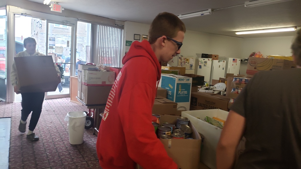 student setting box down